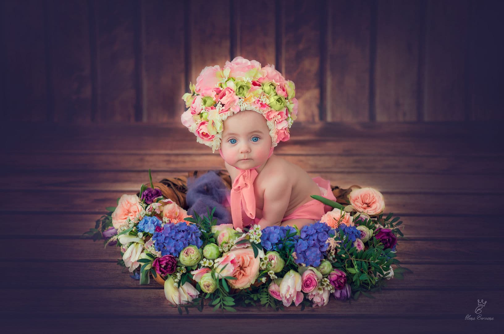 Playful baby cake smash session