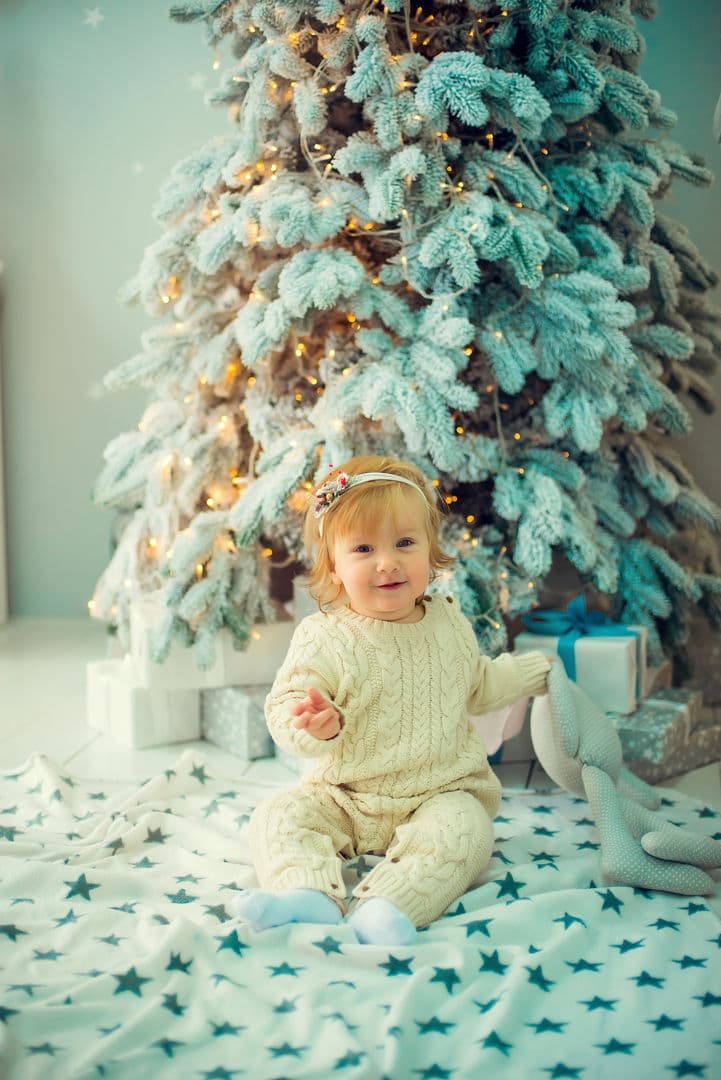 Playful baby during milestone session